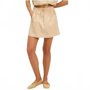 NEW THE GREII women's sporty chic piping detail skirt in beige
